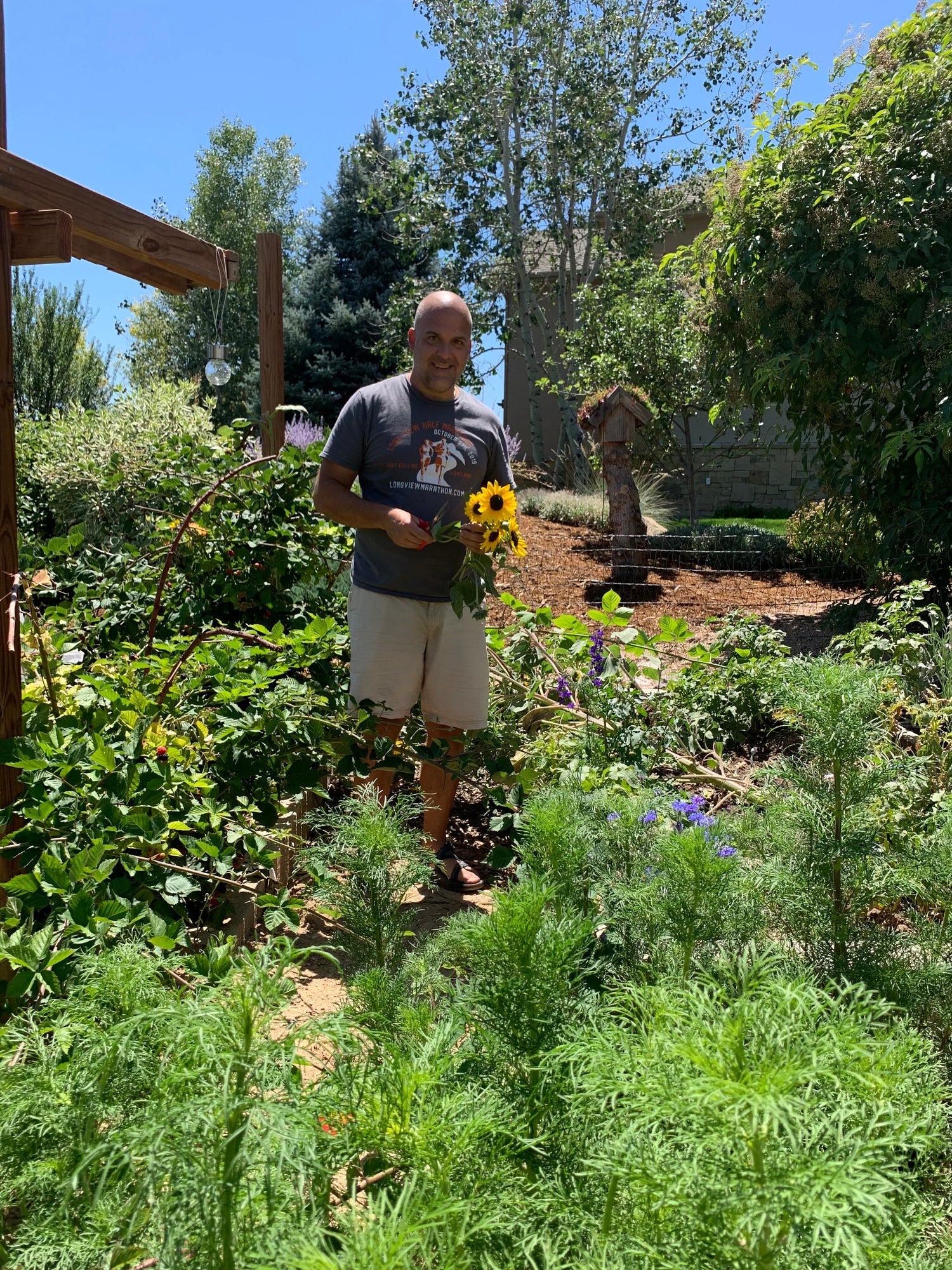 Tim Diana, Owner of Pedaling Pedals, Dahlia, Zinnia, Peony