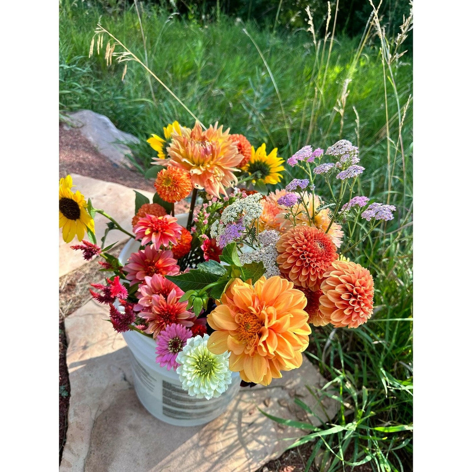 Bright and bold wedding flower buckets
